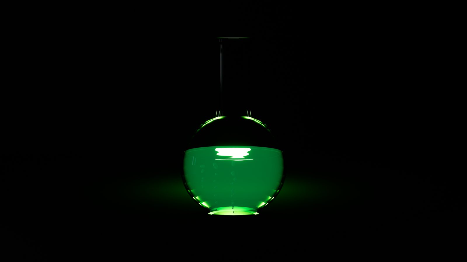 A glowing green potion in a round flask on a dark counter